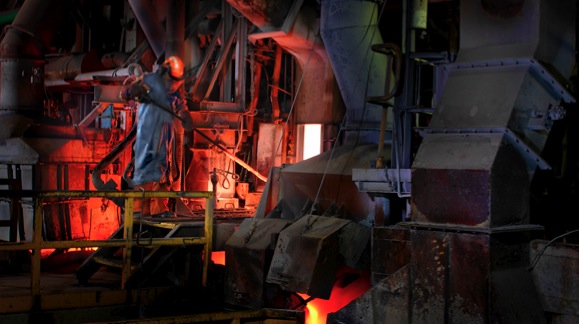 Furnace worker in smelter area
