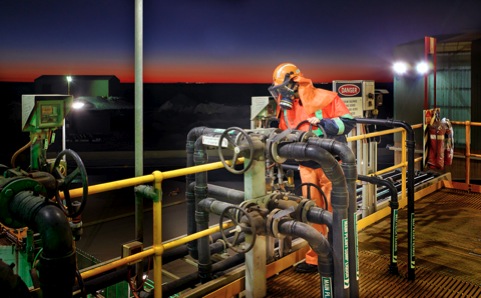 processing plant worker at night